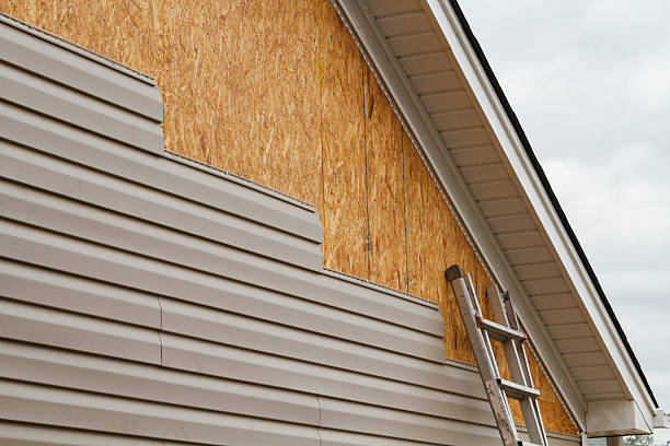 Professional Siding Installation technician working in Russia, OH